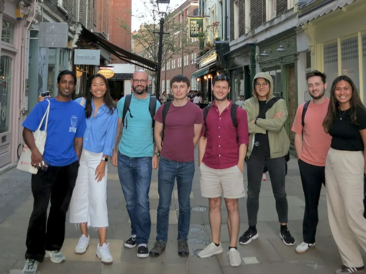 Ten teammates in a London street